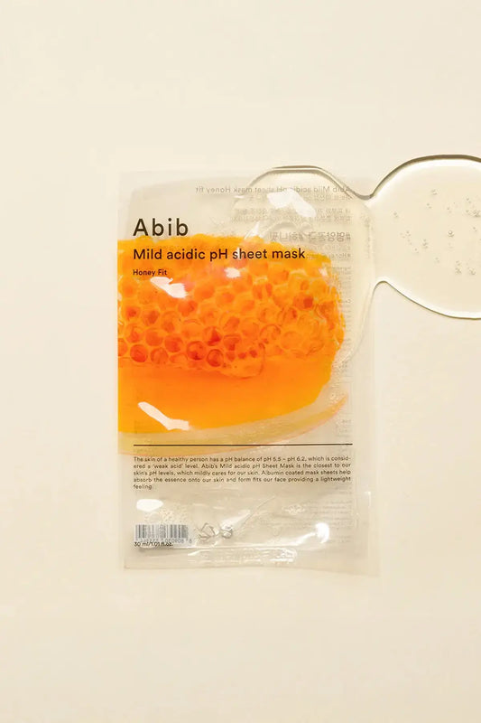 Abib Mild Acidic pH Sheet Mask Honey Fit with honeycomb graphic and golden essence texture, Honey and Propolis Mask inspired skincare option