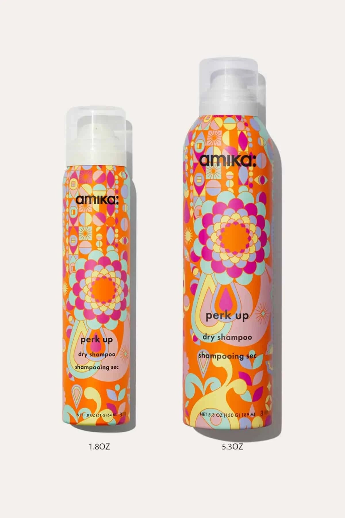 Size comparison of Amika Perk Up Dry Shampoo bottles in 1.8oz travel size and 5.3oz full size.