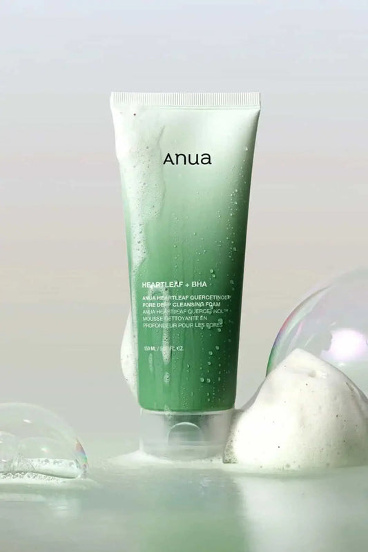 Artistic shot of Anua cleansing foam with dense bubbles, highlighting its refreshing feel as a cleanser for oily skin.
