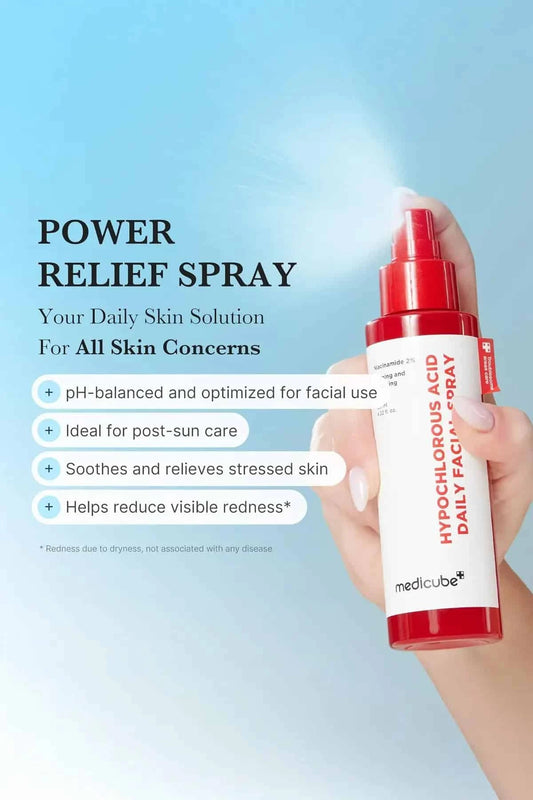 Hand holding the Power Relief Spray, a pH-balanced sensitive skin toner that reduces visible redness and soothes stressed skin.