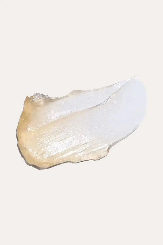 The Doux Push It! Edge Gel Texture Swatch - Close-up of Super-Charged Honey Braid & Edge Gel Formula, Smooth Creamy Consistency for Perfect Edge Control